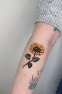 Minimalist Sunflower Gardenia Tattoo