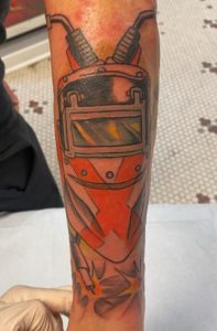 Welding hood tattoo