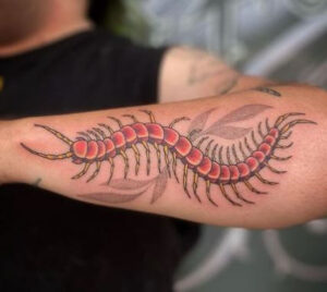 centipede arm tattoo