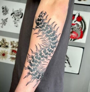centipede hand tattoo