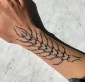 simple centipede tattoo