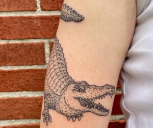 Alligator forearm tattoo