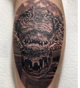 Alligator skin tattoo