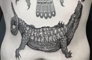 Alligator tribal tattoo