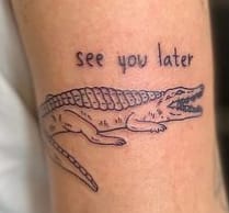 Cute alligator tattoo
