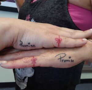 Promise Tattoo on Pinky