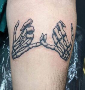 Skeleton Hand Pinky Promise Tattoo
