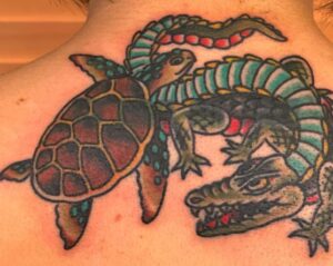 Tortoise and alligator tattoo
