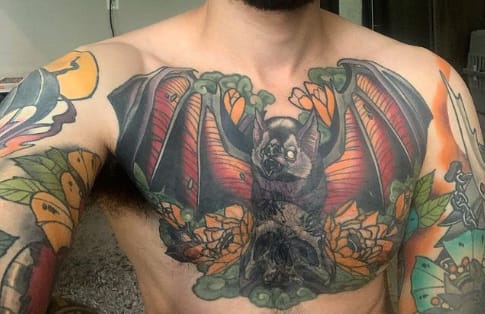 Bat chest tattoo