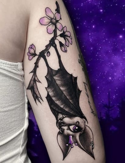 Bat forearm tattoo
