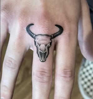 Bison Skull Finger Tattoo