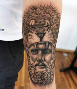 Black Hercules With Lion Tattoo