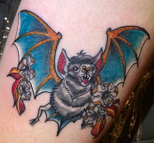 Neotraditional bat tattoo on the hand