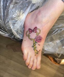 Tattoo uploaded by Lisabar897  Disney key ribbon gem  Tattoodo