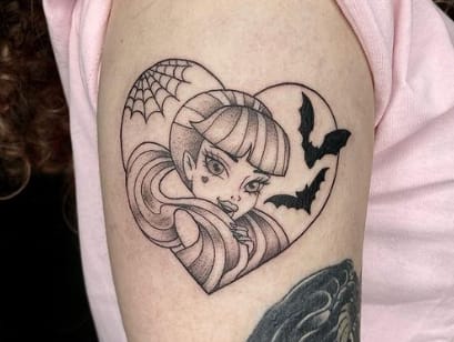 Feminine bat tattoo