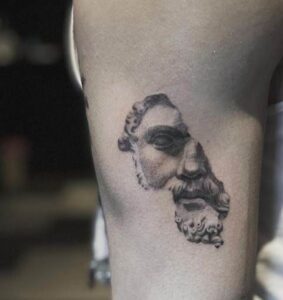 Half-faced Hercules Tattoo