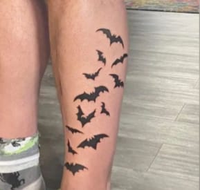 Minimalist Bat Tattoo