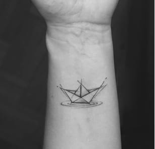 Paper Boat Hand Tattoo