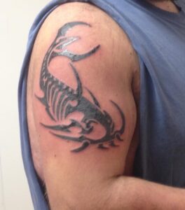 Tribal Arm Catfish Tattoo