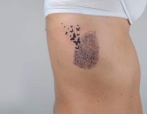 Fingerprint Bird Tattoo