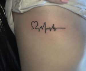 Heart With The Lifeline Tattoo