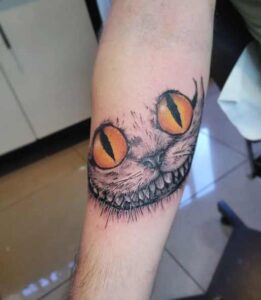 Cheshire Cat Smile Tattoo