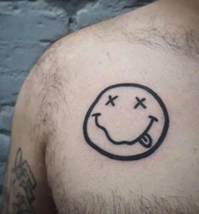 Nirvana Smile Tattoo