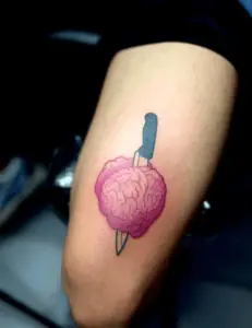 pinky brain tattoo