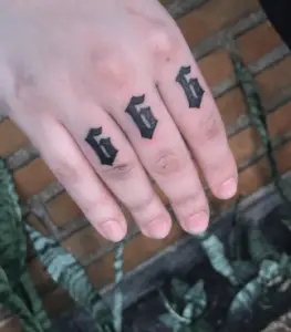 666 finger tattoo