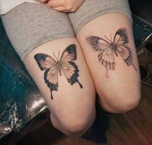 Butterfly Above Knee Tattoo