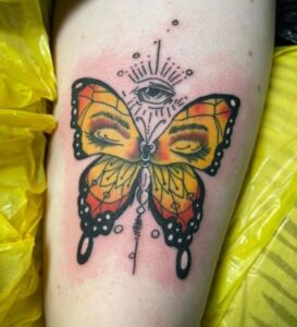 Girl Face Butterfly Tattoo
