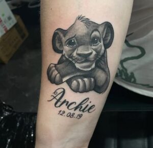 Lion King Forearm Name Tattoo