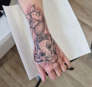 Lion King & Winnie Pooh Tattoo