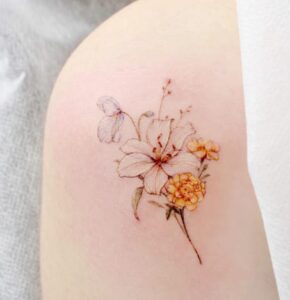 Marigold Flower Tattoo With LIily