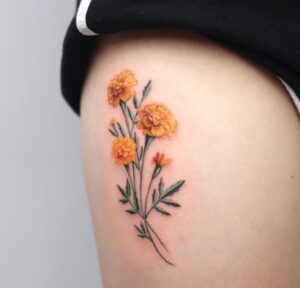 Marigold With Green Leaves Tattoo