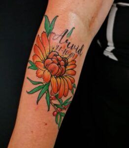 Neotraditional Floral Name Tattoo