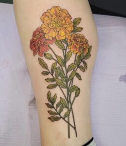 Yellow And Red Floral Leg Tattoo