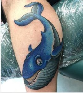 blue whale cartoon tattoo