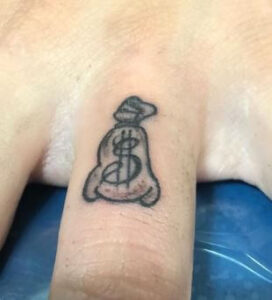 finger money bag tattoo