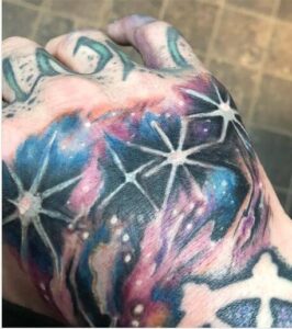 galaxy hand tattoo
