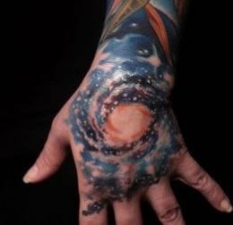 galaxy tattoo hand
