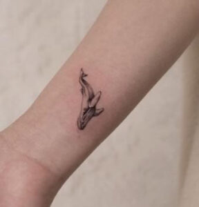 minimalist whale tattoo 4