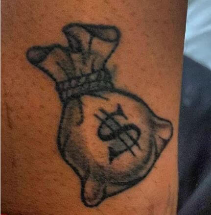 money tattoo sign