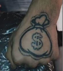 simple money bag tattoo