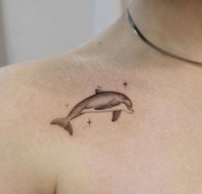 simple whale tattoo 2