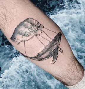 tribal whale tattoo
