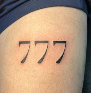 777 angel number tattoo 2