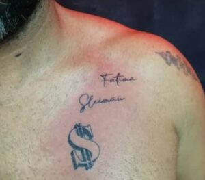 Dollar Sign Chest Tattoo