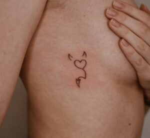 Heart Near Boobs Tattoo
