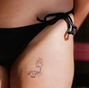 Scorpion Bikini Line Tattoo